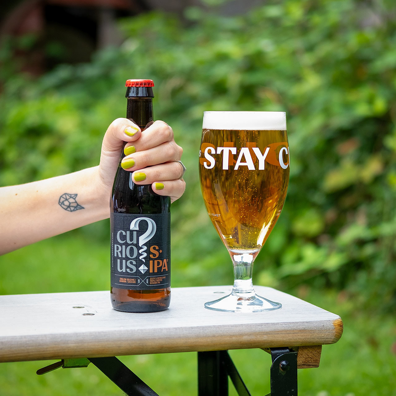 Pouring Sunrise Brewery beer, image 1